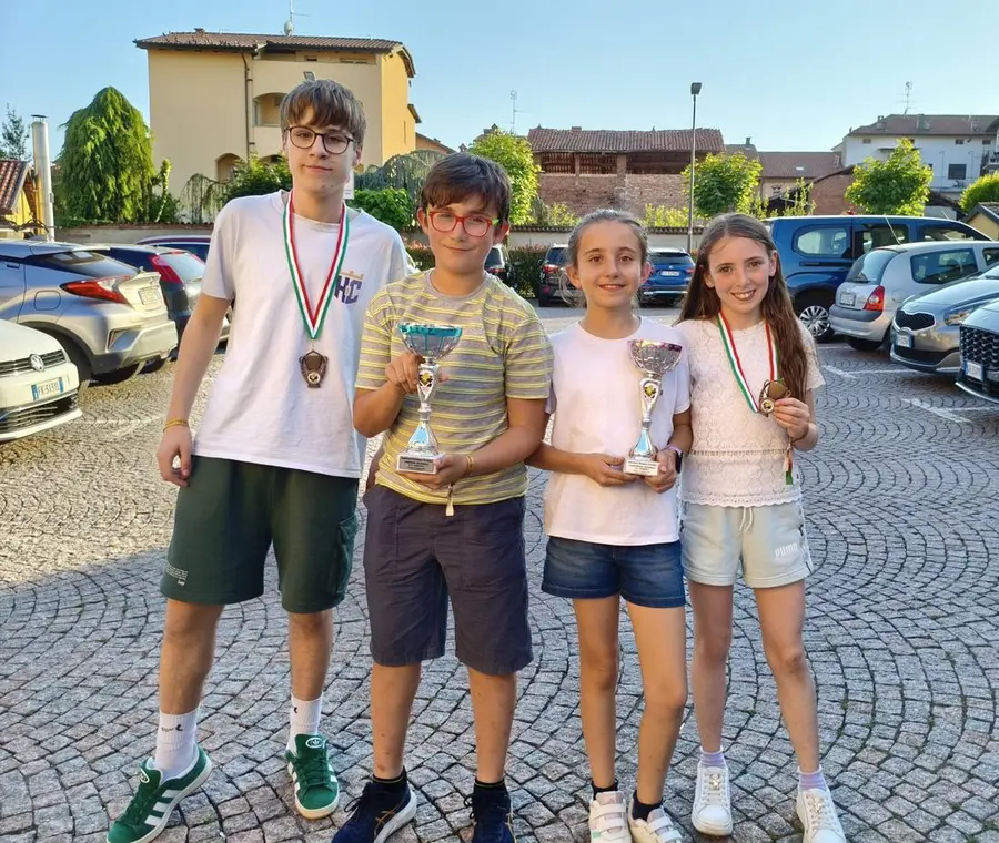 Quattro giovani atleti HOC Academy con coppe e medaglie dopo il Campionato Regionale Piemontese Under 18 2026